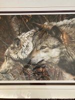 Close-up of two wolves’ heads and upper torsos in the print