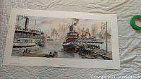 Panoramic limited edition art print depicting harbor scene with steamboats, docks, and city skyline. Signed by Wentworth Folkins with edition number 12/30.