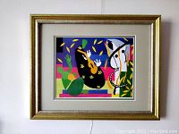 Full view of framed lithograph print with colorful abstract shapes and signature visible at bottom right.
