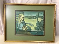 Framed artwork showing a girl playing a concertina at a window, landscape background, green matting, gold frame.