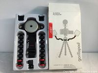 Joby Gorillapod Rig Upgrade in packaging with components visible including mounting plate and flexible legs.