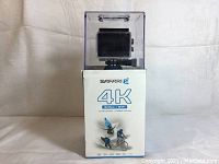 Safari 3 4K action camera in original box showing product branding and capabilities.