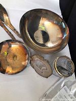 Copper and silver plated ladles, hammered copper bowl, copper bowl with engraving, agate slice and glass ice bucket with ladle