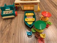 Fisher Price Play Family Camper, boat, Jeep, and picnic tables with chairs