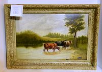 Full view of the oil painting in ornate frame showing three cattle by water and landscape background.