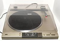 Full view of Pioneer PL-L800 turntable with dust cover closed, showcasing its silver metallic body and black platter.