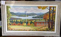 Framed landscape painting showing building, Quebec flag, lake and mountains
