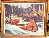 Framed print of RCMP officer and indigenous companion canoeing down rapids with wooded background