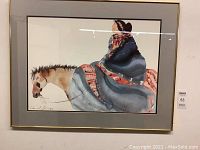 Front view of the framed watercolour print showing horse and rider with artist signature