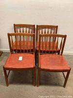 Four chairs arranged in two rows showing overall set