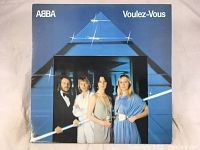 Front cover of Abba Voulez-Vous vinyl LP showing band members and album title.
