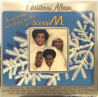 Front cover of the vinyl album with group photo and decorative snowflake design.
