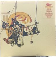 Front cover of Chicago Greatest Hits vinyl LP album showing band members in ropes with large stylized 8 logo on cream background.
