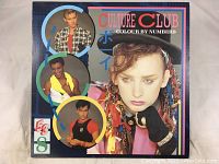 Front cover of Culture Club Colour By Numbers vinyl LP album featuring band members and colorful design.