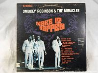 Front/back cover of the 'Make It Happen' album by Smokey Robinson & The Miracles featuring album title, artist name, photo of the group, and track listing.