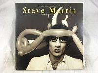 Front cover of the album showing Steve Martin with a balloon hat and glasses.