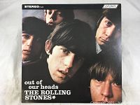 Front cover of The Rolling Stones Out Of Our Heads album showing band photo and text.