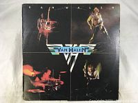 Front cover of Van Halen self-titled album showing band members and logo.