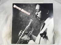 Front album cover featuring Wynton Marsalis in black and white with trumpet.