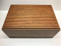 Top view of rectangular hardwood box with smooth grain and finish