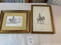 Pair of prints by Charles R Crouch shown side by side on table, depicting cowboys on horseback.