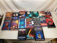 Front view of 17 Star Trek hardback books with colorful covers.