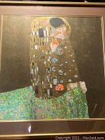 Full view of framed print showing Gustav Klimt's 'The Kiss' image and gold-finish frame