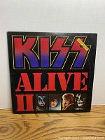 Front cover of Kiss Alive II vinyl album sleeve with large KISS name and Alive II title