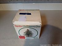 Original white box with Spode Christmas Tree logo and graphics, shows the box's top and side with seller's tag, indicating the set of 4 wine glasses"