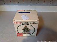 Original box of Spode Christmas Tree wine glasses with design illustration and text.