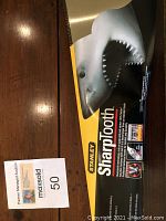 Saw in original Stanley Sharptooth packaging showing shark image and product branding.