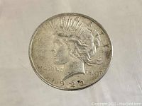 Obverse side of the 1922 Peace Dollar showing Lady Liberty and date.