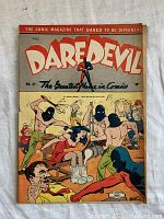 Front cover showing Daredevil title, central figure, masked attackers, 10¢ price and tagline.