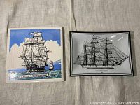 Photo showing both items side by side on cloth background, tile on left with color design, dish on right with black and white design.