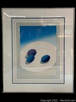 Framed limited edition print by W.R. Elliott showing three plums on a plate with blue gradient background. Print is signed and numbered in pencil below the image.