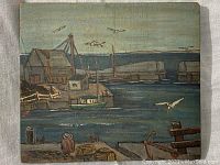 Frontal view of the small wood panel painting showing boats, buildings, water and seagulls