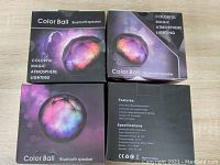 Boxes of Color Ball Bluetooth speakers showing colorful magic atmosphere lighting and diamond cut crystal design features