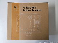 Box labeled 'Portable Mini Suitcase Turntable' with brand Music Public Kingdom and model TT251