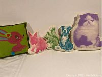 Group shot of all 5 animal pillows showing overall design and color