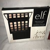Photo of the Elf 20 color eye palette packaging showing the open palette with neutral shades and mirror.