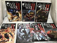 Seven comics from Civil War II series, issues 0 to 6, shown fanned out on a surface with covers visible featuring Iron Man and other characters.