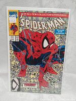 Front cover of Spider-Man Issue No. 1 comic book showing Spider-Man in a crouching position with webs in the background, with pricing and issue details visible.