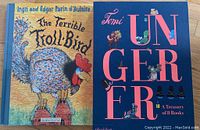 Front covers of two European children's hardcover books. The Terrible Troll-Bird by Ingri and Edgar Parin d'Aulaire on the left, and Tomi Ungerer Treasury, an 8-book collection, on the right.
