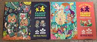 Both Family Puzzle sets, Catstronauts and Purrmaid Paradise, unopened and in packaging.