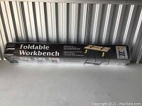 Box packaging showing 'Foldable Workbench' branding and product image.