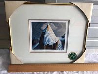 Front view of framed print showing the full artwork, double matting, gold-tone frame, and 75th anniversary seal inside matting.