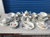 Full display of all china pieces on table