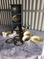 Full lot with blue wooden display stand, Bunnykins plate, glass goblets, figurines, and decorative items.