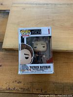 Front view of Patrick Bateman Pop! figure in box showing character name and branding