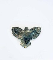 Front view of hand carved bird-shaped labradorite gemstone showing detailed carving and color flash.